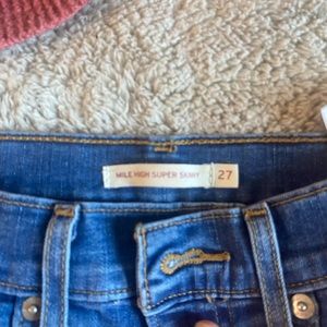 Super cute Levi jeans 👖 the bottoms are my fave part frayed a little